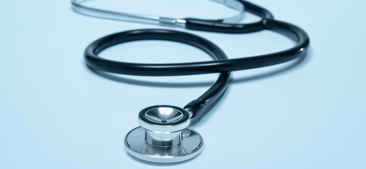 stethoscope-on-light-blue-background-