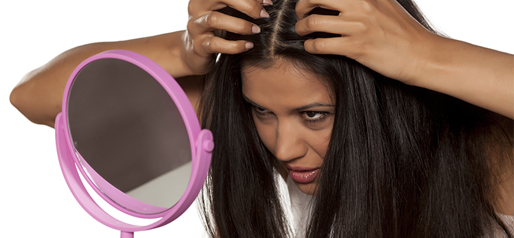 young-woman-looks-root-her-hair