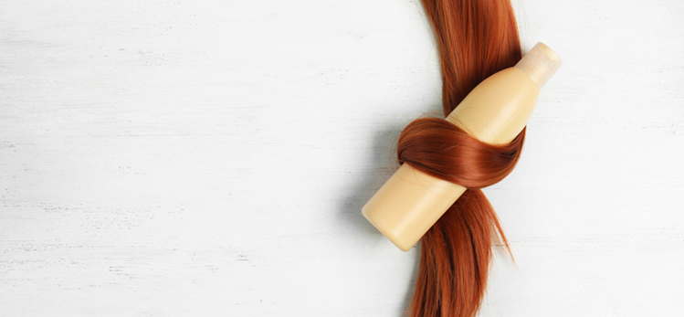 How-To-Choose-Shampoo-For-Your-Hair-Type/shampoo-bottle-wrapped-lock-hair